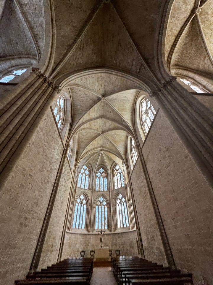 Inside the chapel at the Monasterio de Santa María, Renaissance altarpiece, 15th century Madonna and Child statue, and the tomb of Doña Urraca López de Haro.