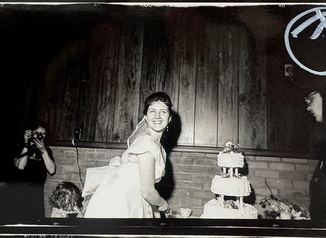 Analog photos of cakes at weddings by Angela Cappetta.