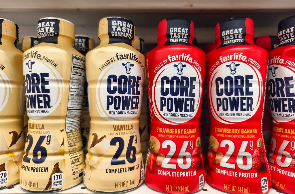 Core Power high-protein milk shakes on a supermarket shelf.