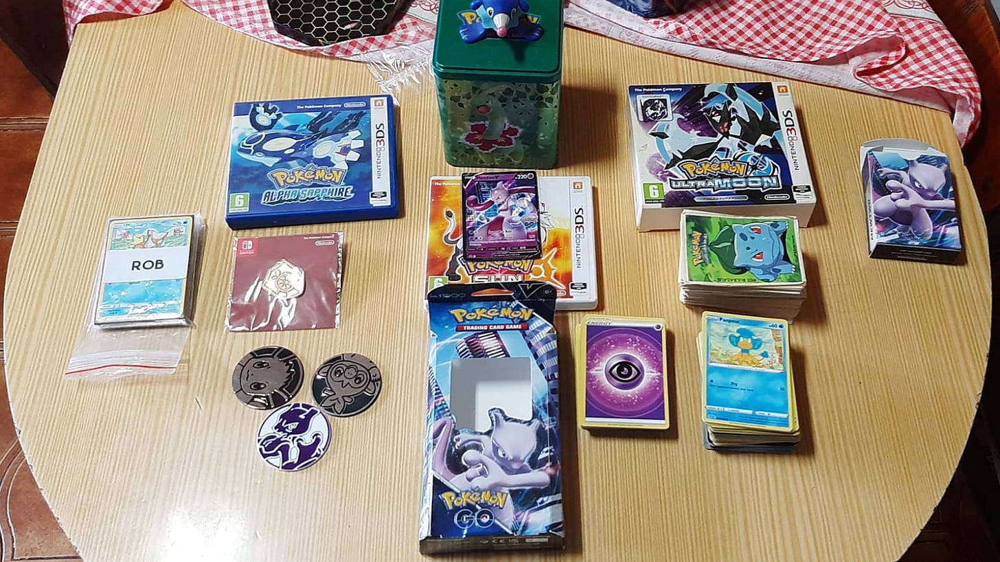 Rob’s impressive collection of Pokémon merchandise includes stickers, cards, games, and other cool items