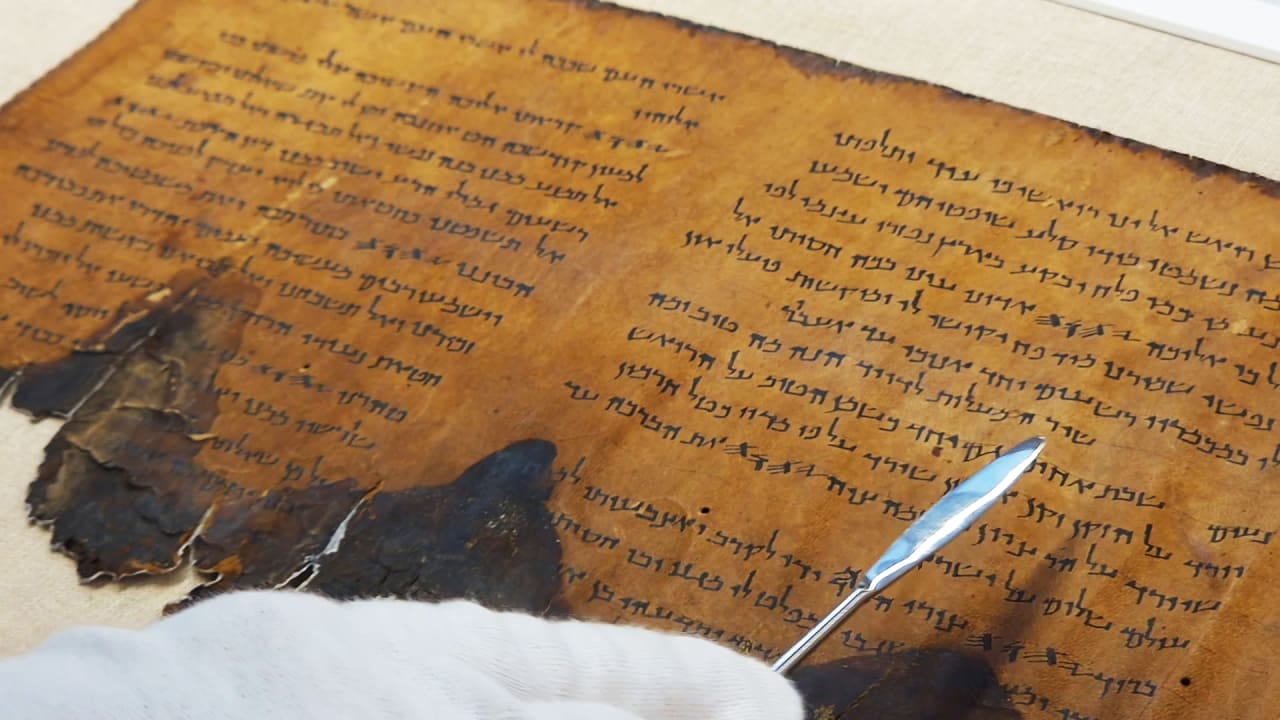 A fragment of a 2,000-year-old Psalms Scroll from the Dead Sea Scrolls collection. *Illustrative image.* **Photo credit:** Yoli Schwartz / Israel Antiquities Authority A fragment of a 2,000-year-old Psalms Scroll from the Dead Sea Scrolls collection. *Illustrative image.* **Photo credit:** Yoli Schwartz / Israel Antiquities Authority