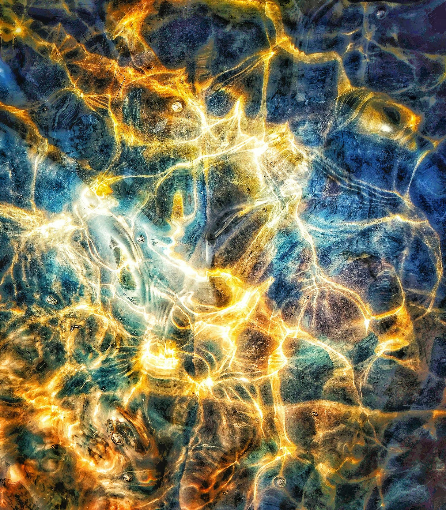 Abstract blue and gold light patterns suggesting neural pathways and emotion — a visual metaphor for the brain learning to regulate fear.