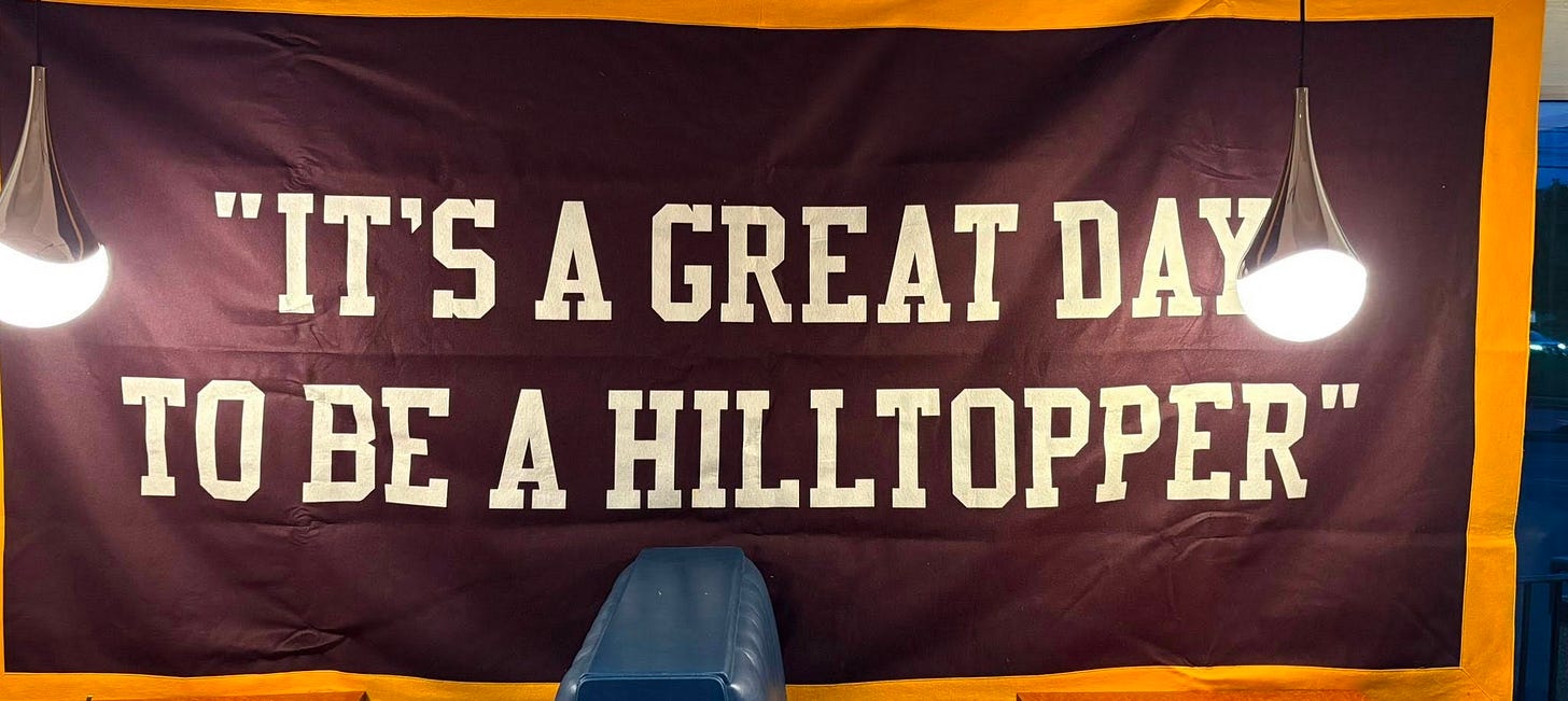 May be an image of trampoline and text that says '"IT'S A GREAT DAY ΤΟ BE A HILLTOPPER"'
