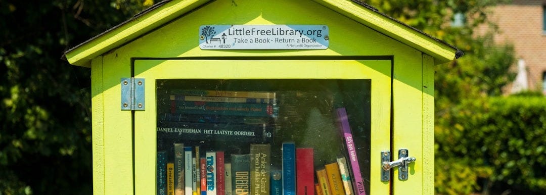 yellow wooden framed glass window