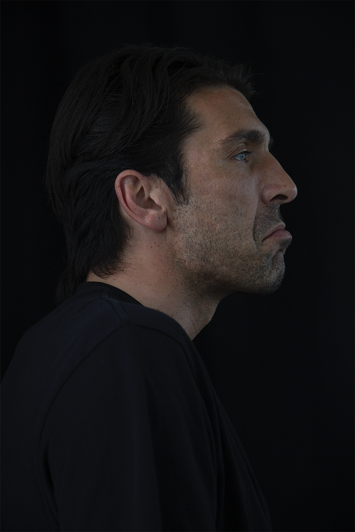 Gianluigi Buffon during an interview, shown in four portraits against a black background: smiling, speaking, in profile with a serious expression, and gesturing mid-sentence.