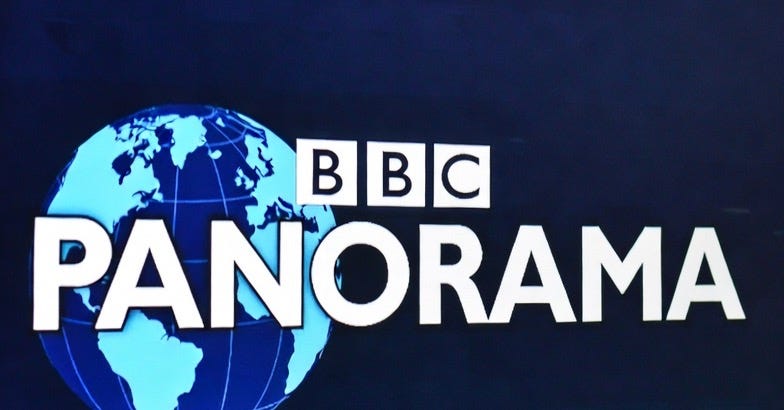 A photograph of the BBC Panorama logo on a dark blue screen, in a documentary style.