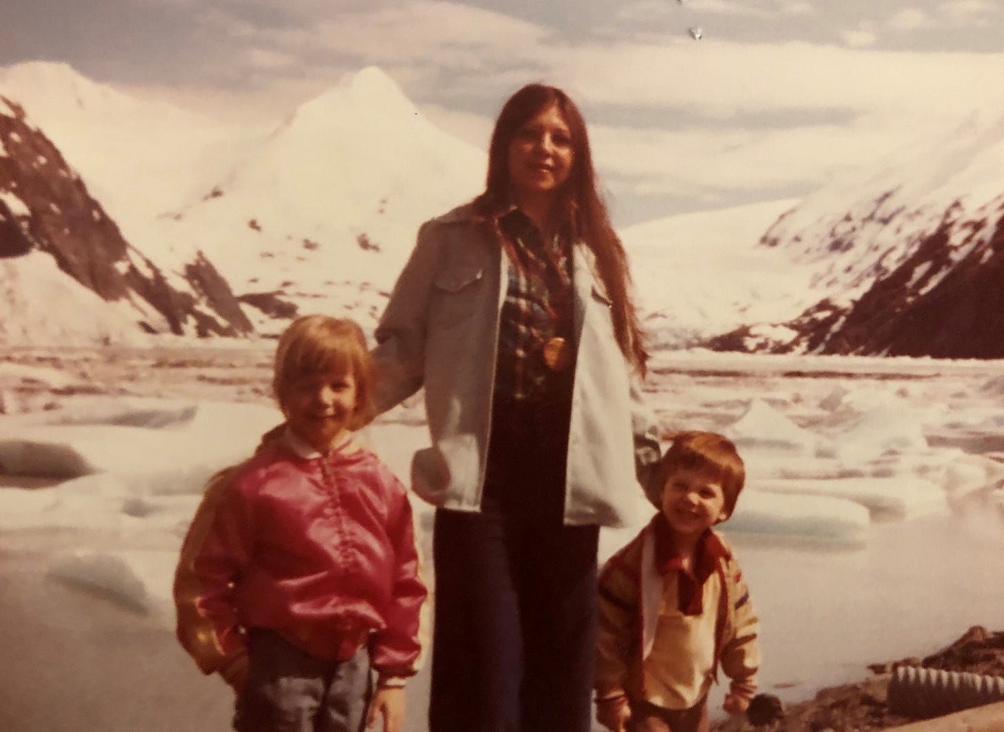 Mary of Alaska Stories, in front of Portage Glacier, circa 1970s. 