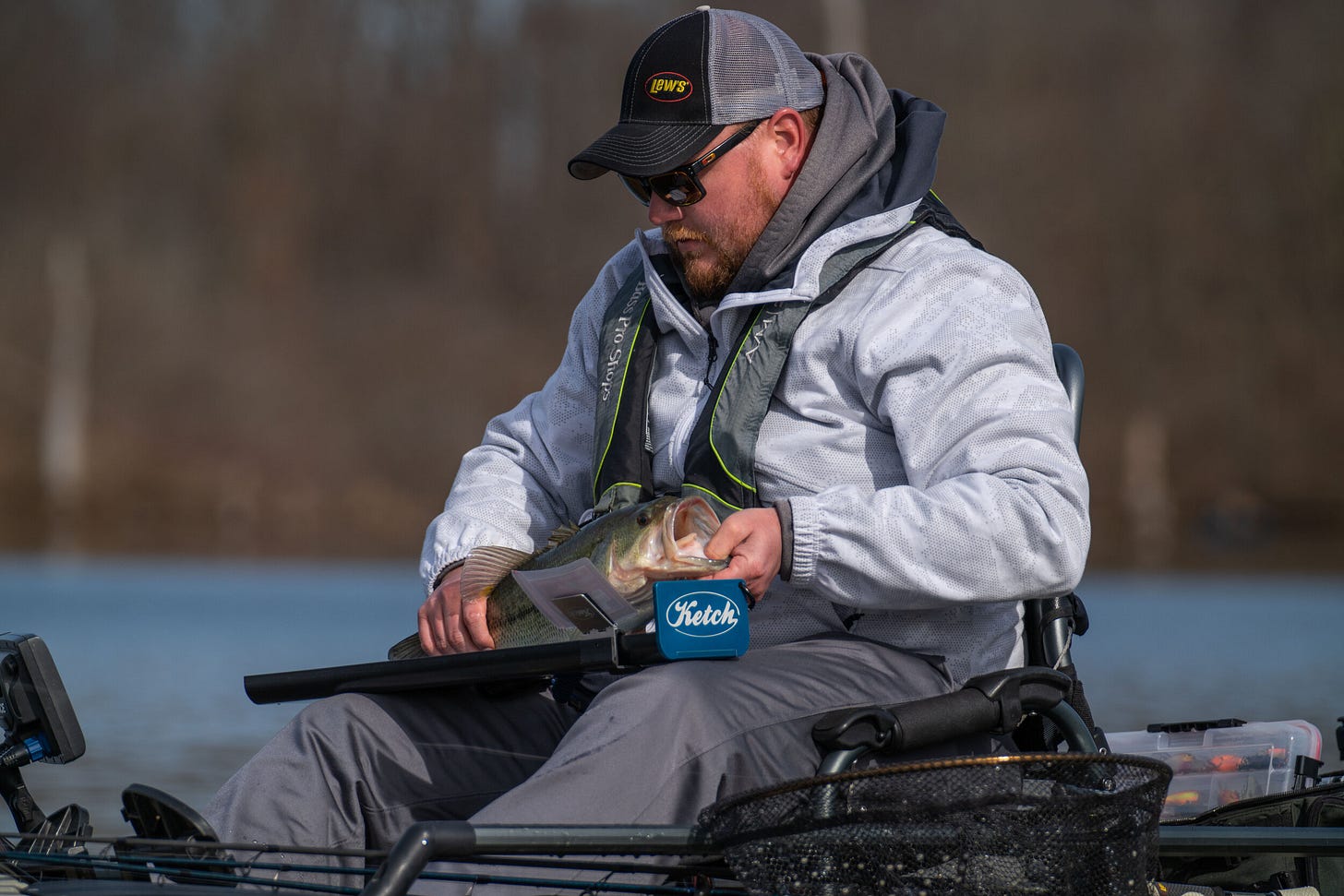  The art of catch-photo-release. Drew Duncans measuring a solid keeper on the KETCH Board. 