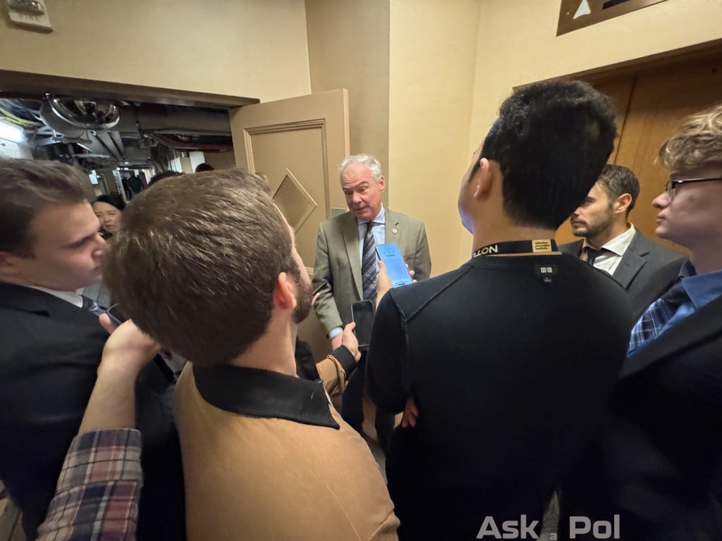 A man in a suit answers questions from a small gaggle of reporters in the basment of the US Capitol. Photo: Matt Laslo © www.askapolitics.com A man in a suit answers questions from a small gaggle of reporters in the basment of the US Capitol. Photo: Matt Laslo © www.askapolitics.com