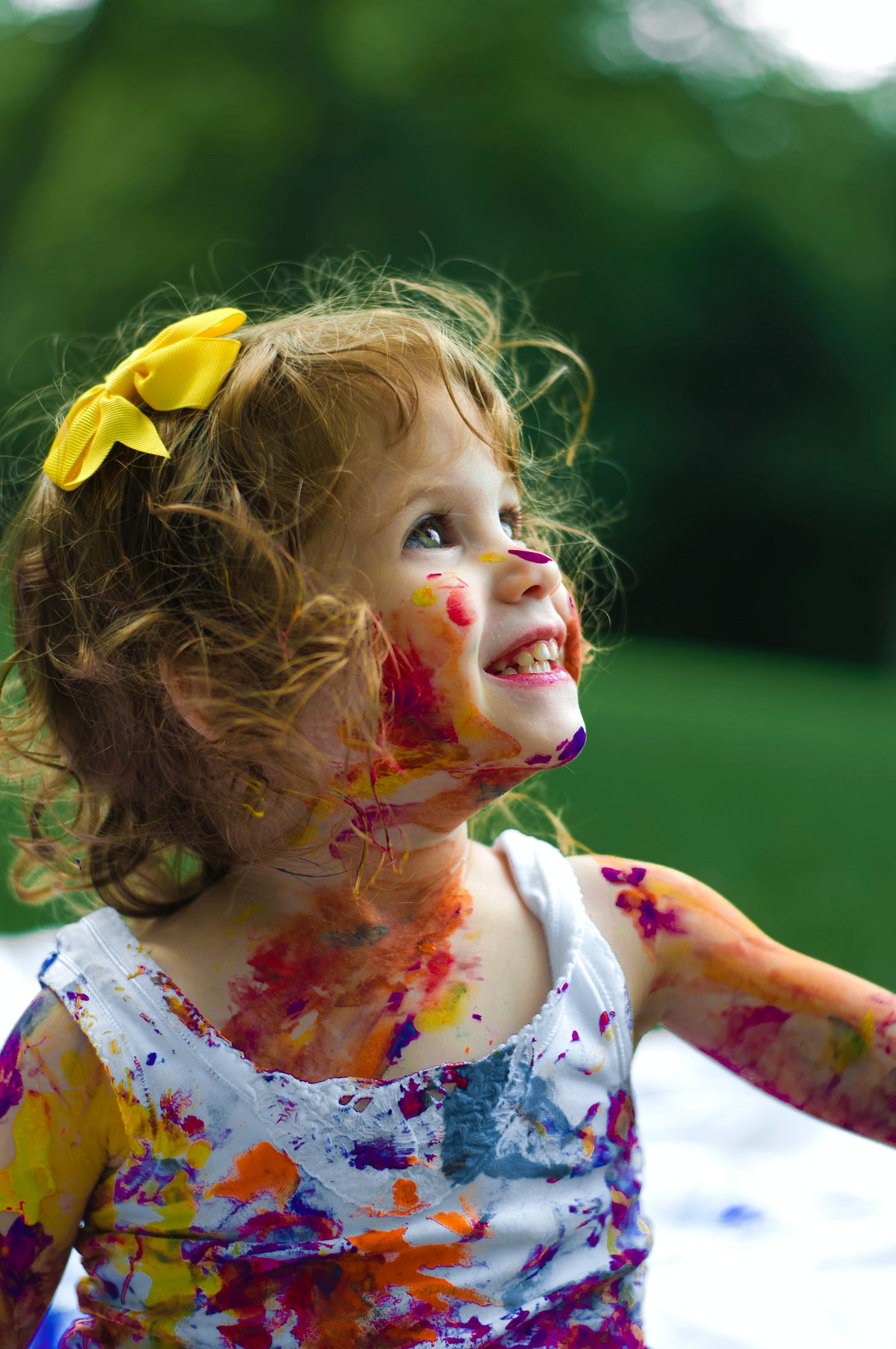 Girl covered in paint