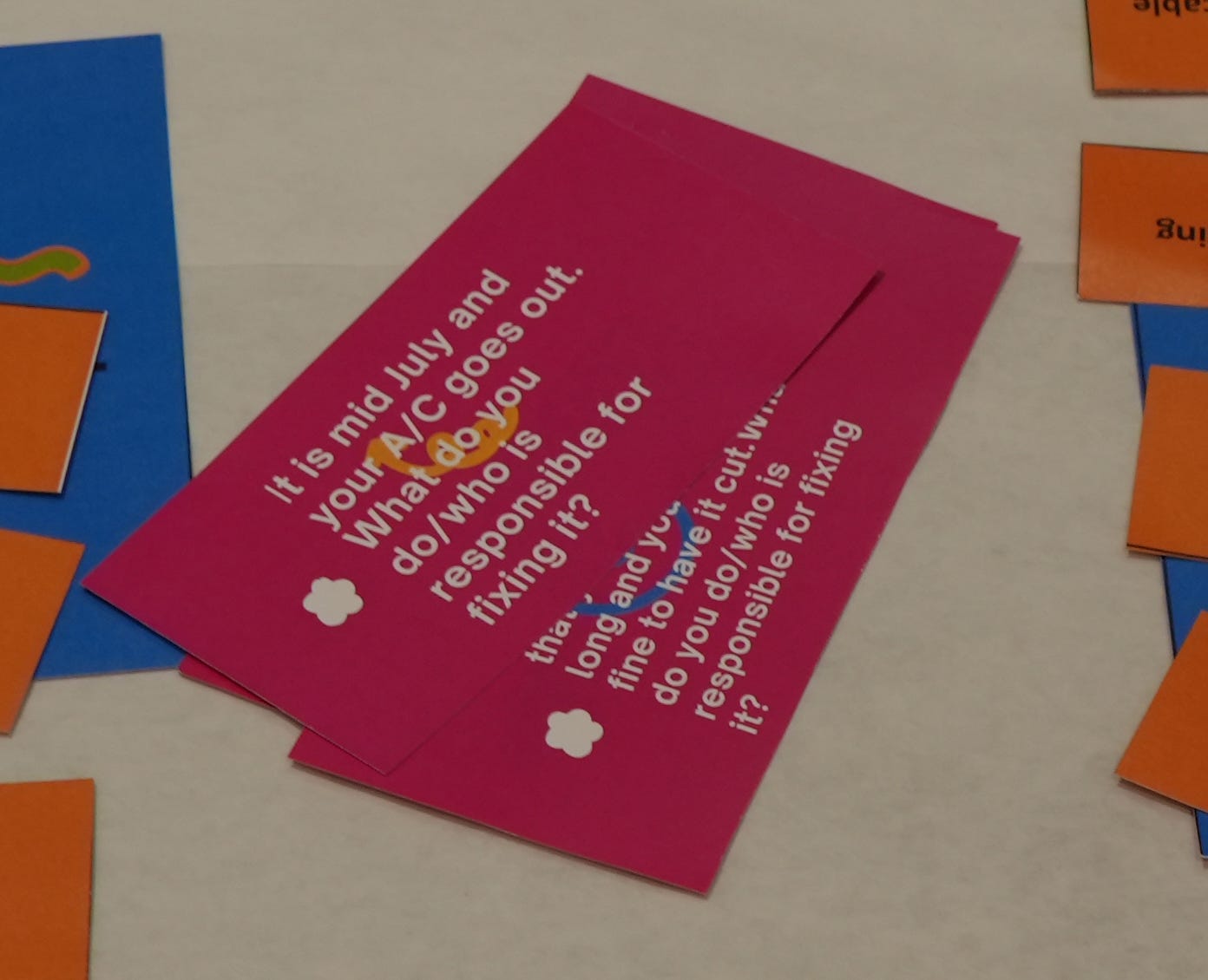 A card says, “It is mid July and your A/C goes out. What do you do/who is responsible for fixing it? A card says, “It is mid July and your A/C goes out. What do you do/who is responsible for fixing it?