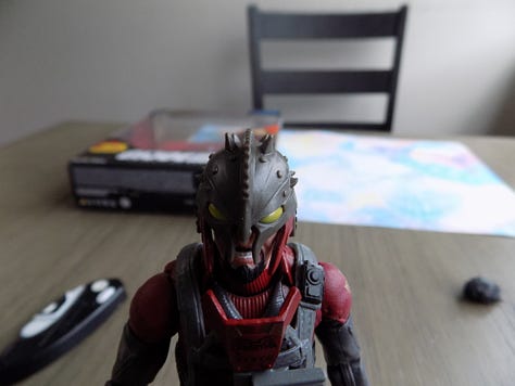 Pictures of the figure each a different head shown off