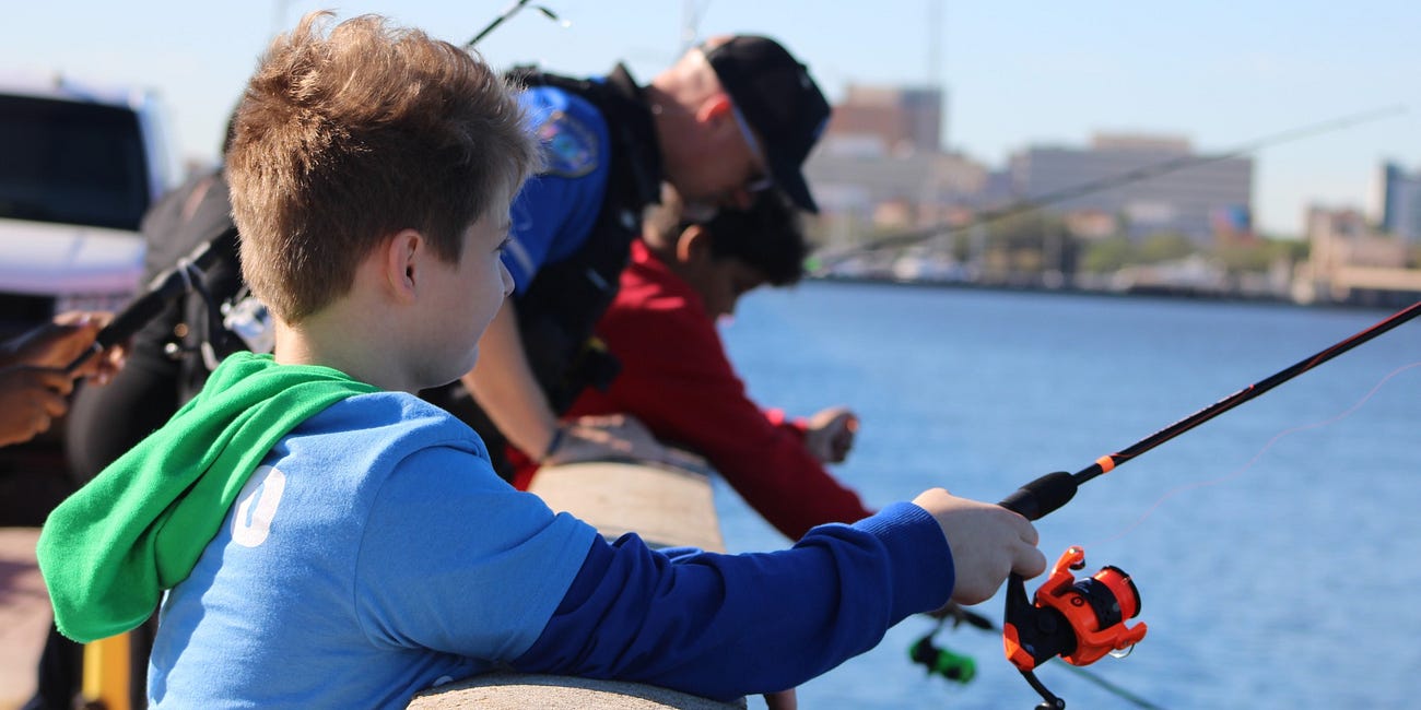 Bridging the Gap Fishing Tournament Strengthens Bonds Between Law Enforcement and Local Youth 