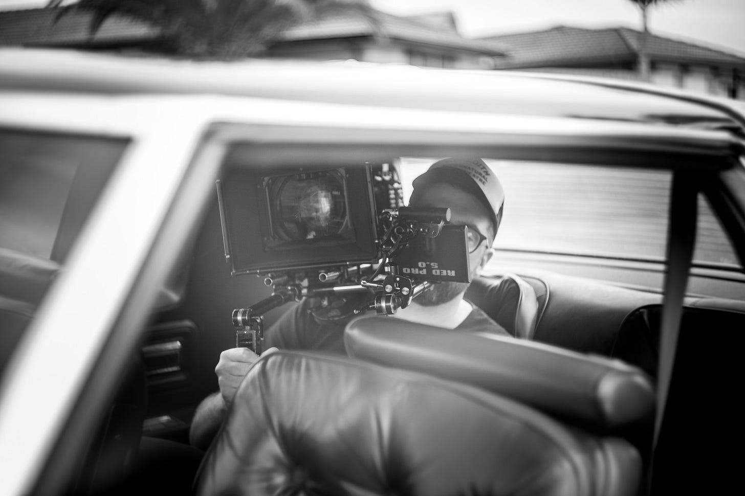 May be an image of 1 person and camera
