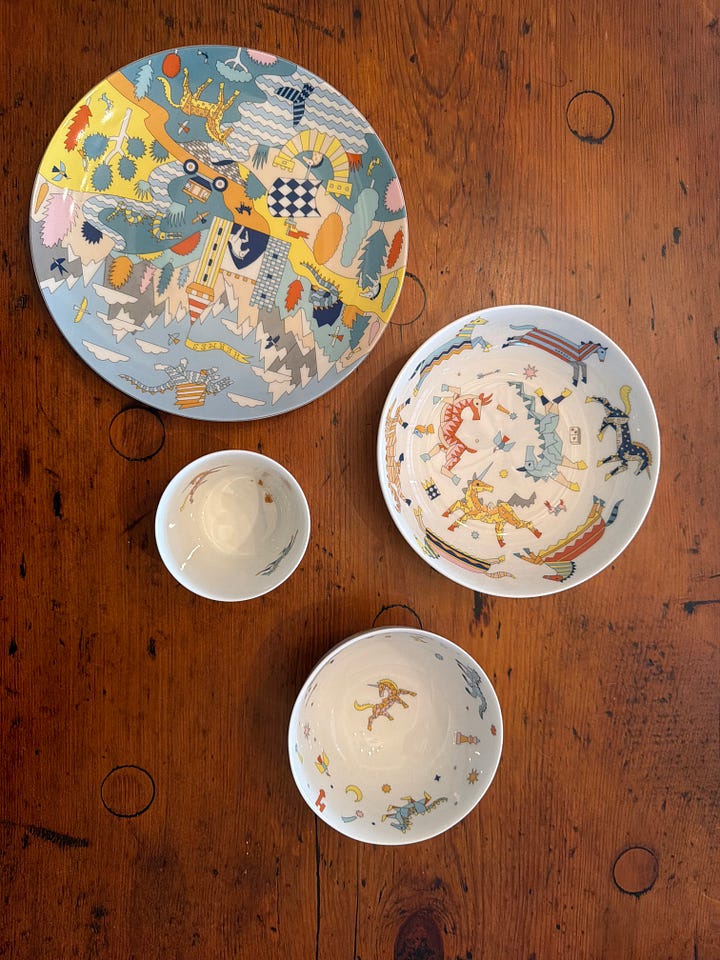 a set of Hermes dishes and cups