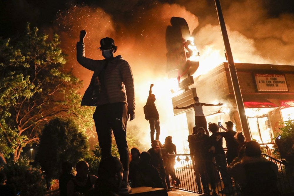 Protesters torch Minneapolis police station in violent night - NEWS 1130
