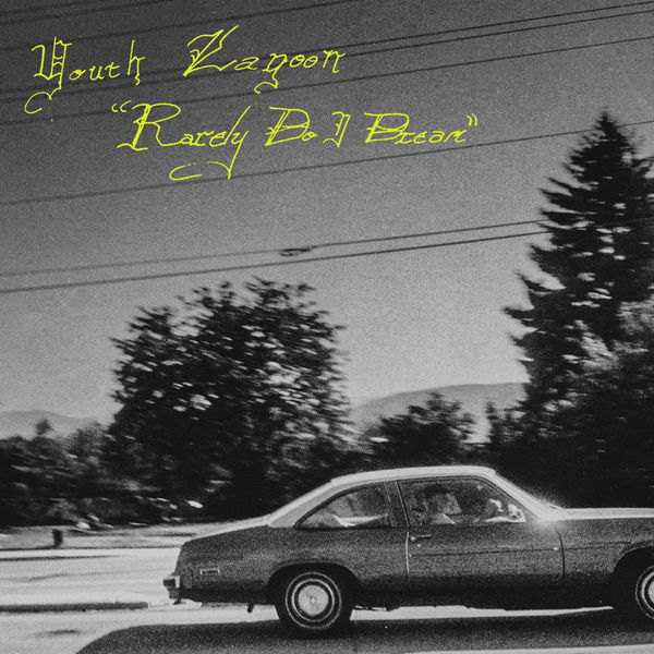 Album cover for Rarely Do I Dream. A black and white photo of a Chevy Nova driving past a landscape of evergreen trees as powerlines stretch overhead. The album's title is scrawled in neon yellow writing in the top left corner. 