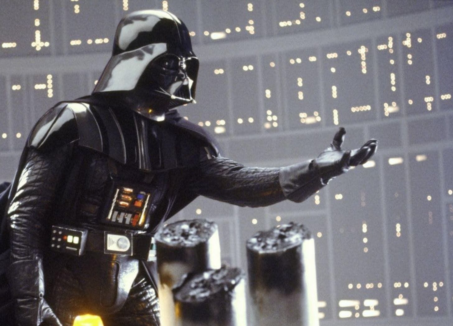 Darth Vader extends a hand toward his son (off screen)