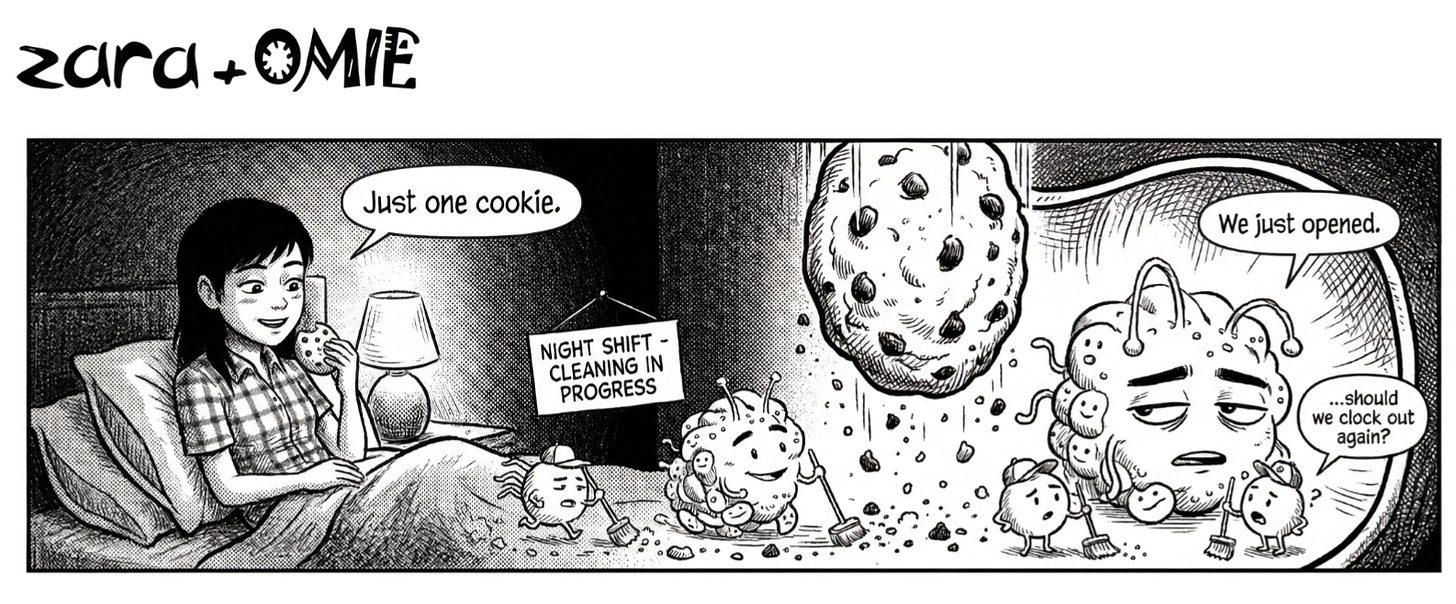 Zara eats a late-night cookie as Omie and tiny microbes pause their “night shift cleaning” inside her stomach when a cookie drops in.