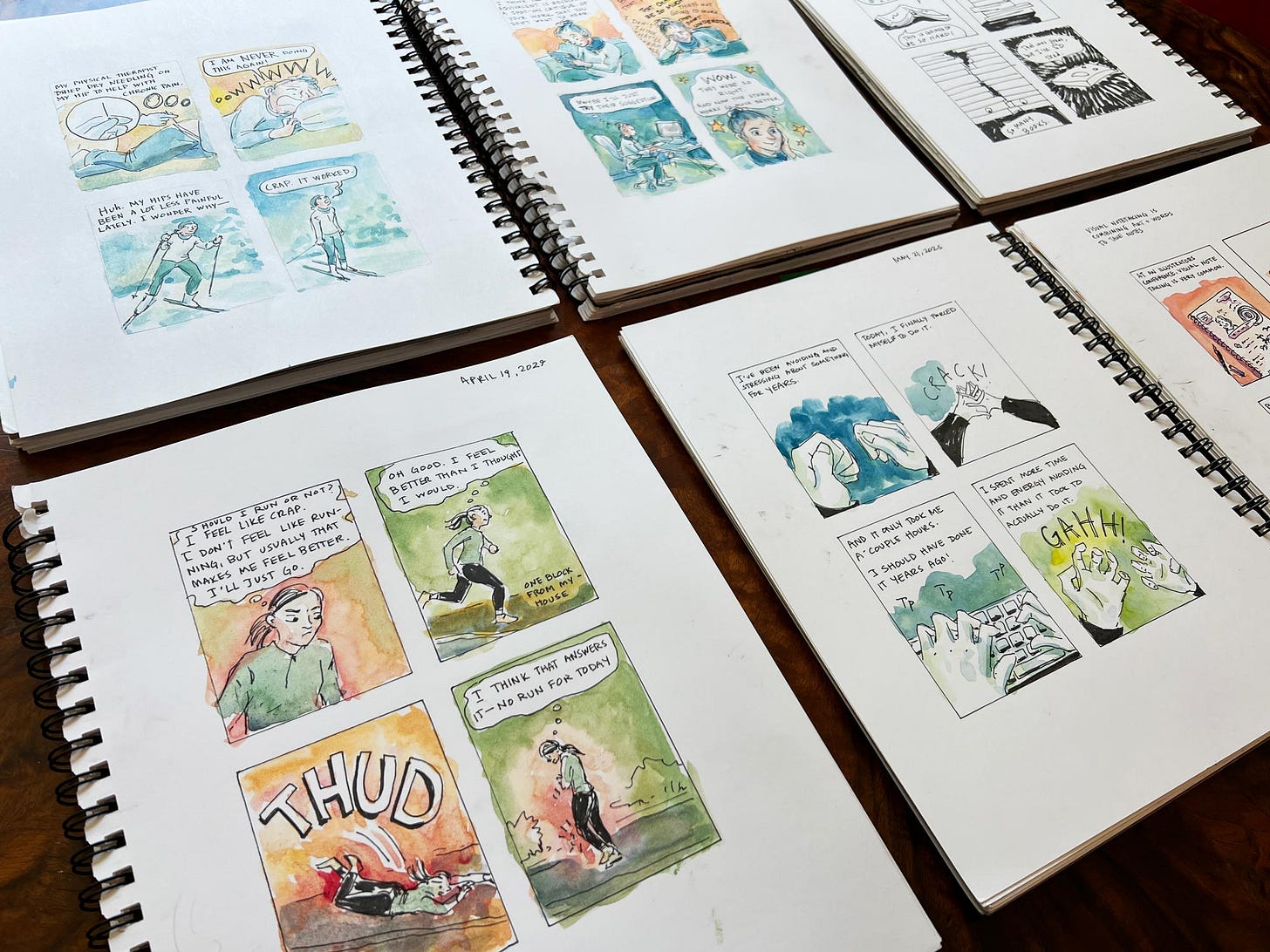 K. Woodman-Maynard, sketchbooks filled with watercolor and ink diary comics that she has illustrated throughout the years. K. Woodman-Maynard, sketchbooks filled with watercolor and ink diary comics that she has illustrated throughout the years.