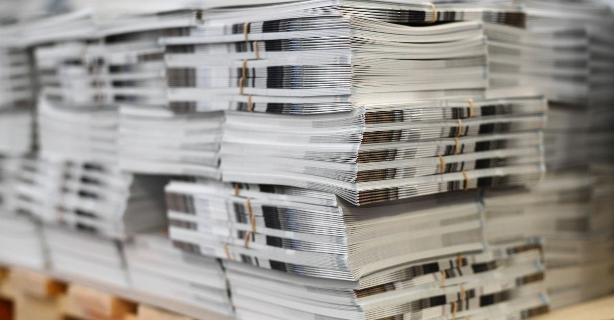 Pile of printed brochures