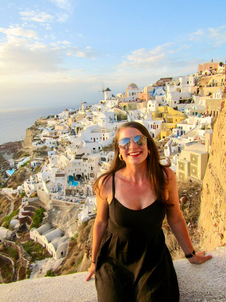 A travel collage: a woman poses in front of St. Basil's Cathedral in Moscow's Red Square (left), and smiles with the white-washed clifftop village of Santorini, Greece stretching behind her (right).