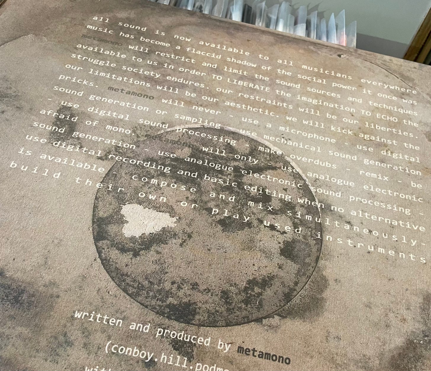 Sleeve was produced from the remnants of another damp-riddled record, and features the Metamono ‘manifesto’ Sleeve was produced from the remnants of another damp-riddled record, and features the Metamono ‘manifesto’