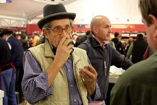 Truffles - man with hat, smelling truffles at 350 dpi Truffles - man with hat, smelling truffles at 350 dpi