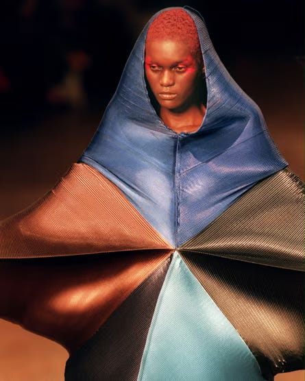 Clockwise from top left: Issey Miyake Spring/Summer 1995 (Flying Saucer collection), Autumn/Winter 1994, promotional image from 1994, and mid-1990s Pleats Please editorial featuring printed body scan imagery; bottom left shows a sculptural look from the Rhythm Pleats series. These works exemplify Miyake’s transformation of fabric into kinetic form, using pleating, geometry, and body-mapping to merge movement, technology, and design into a single visual language.