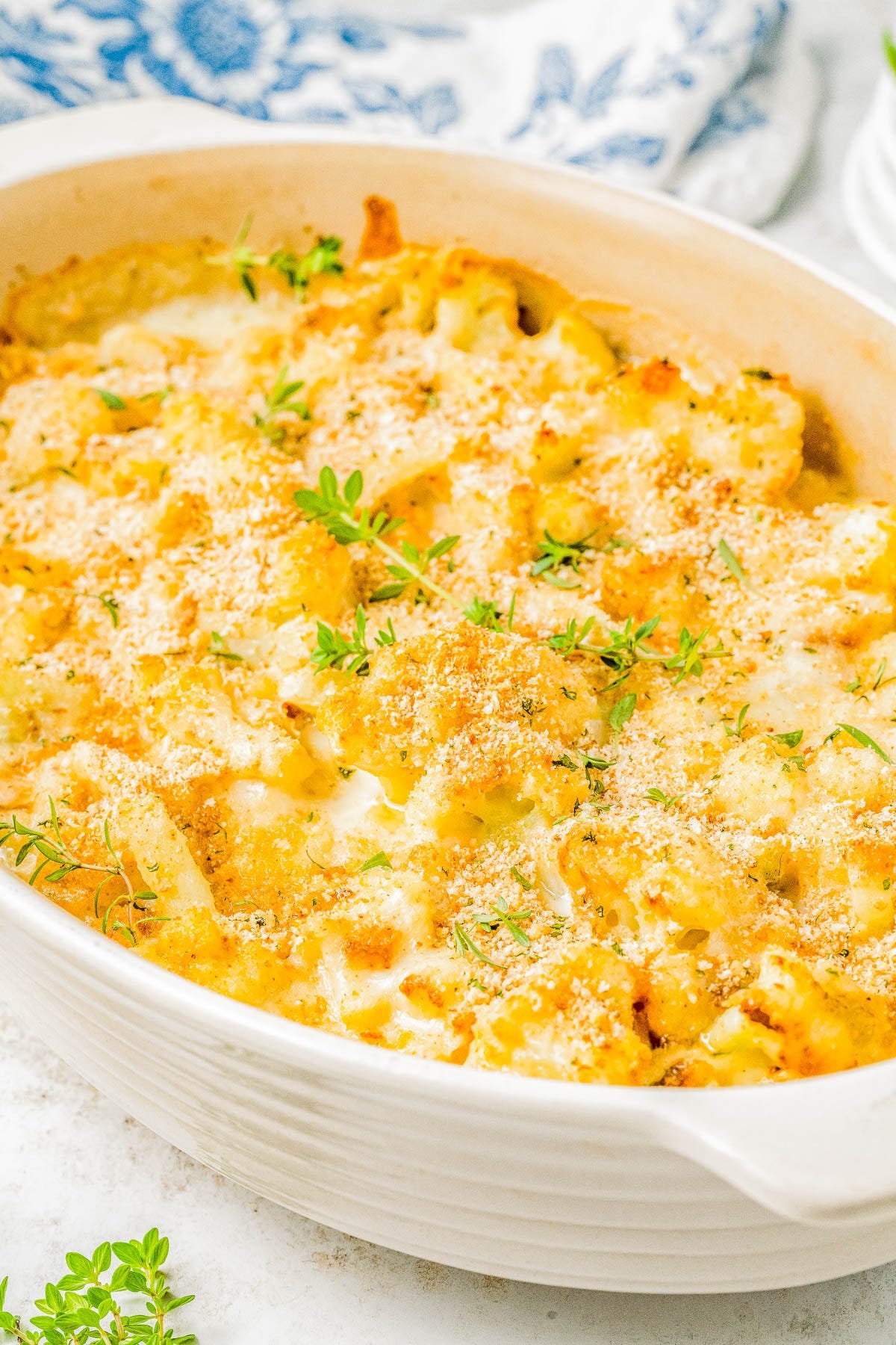Cheesy Cauliflower Gratin in a white baking dish. 