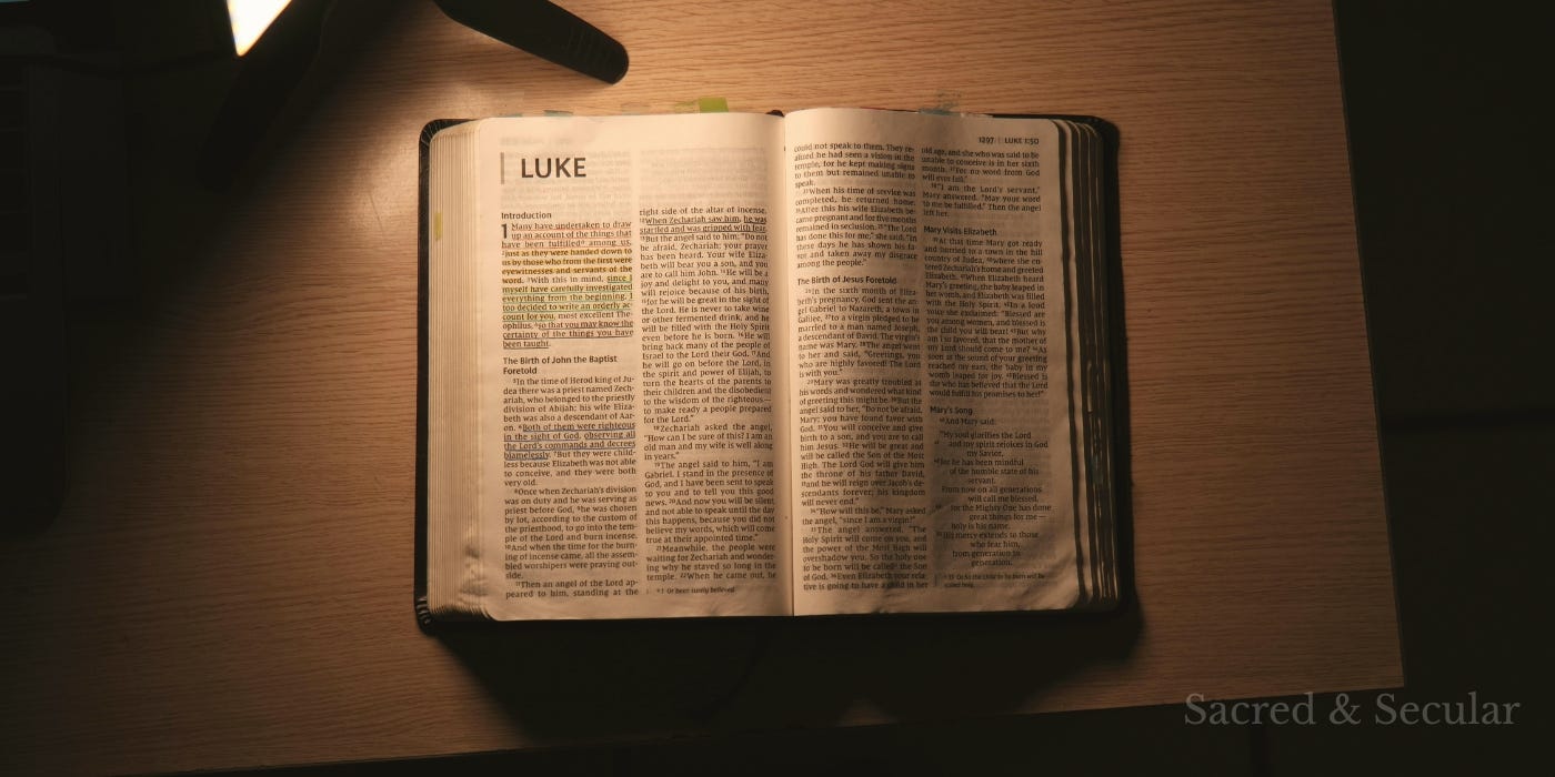 Open Bible resting in soft natural light, with pages gently illuminated in a calm and reflective setting.