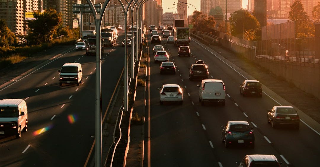cars on road during daytime cars on road during daytime