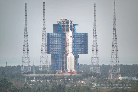 One of the Long March 5's boosters as well as the Y10 vehicle rolling out to and at Launch Complex 101.