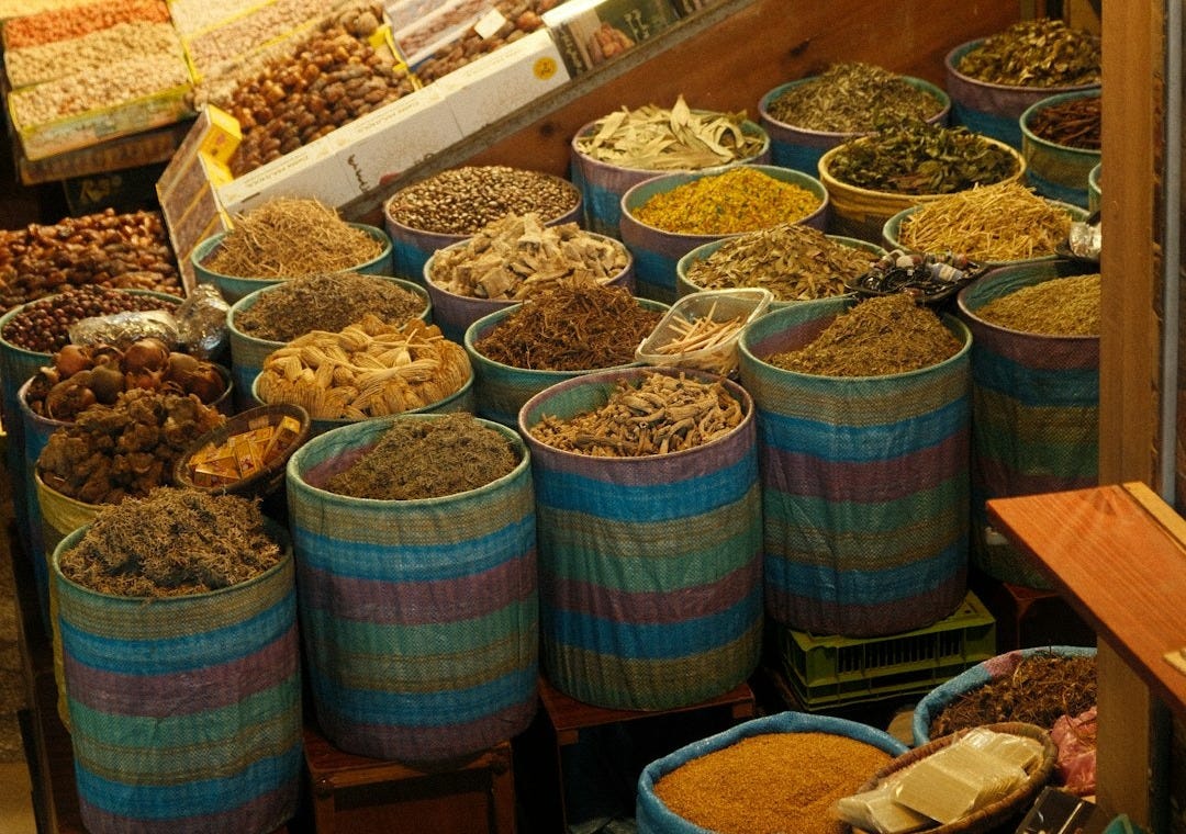 A vibrant spice market stall is full of goods. A vibrant spice market stall is full of goods.