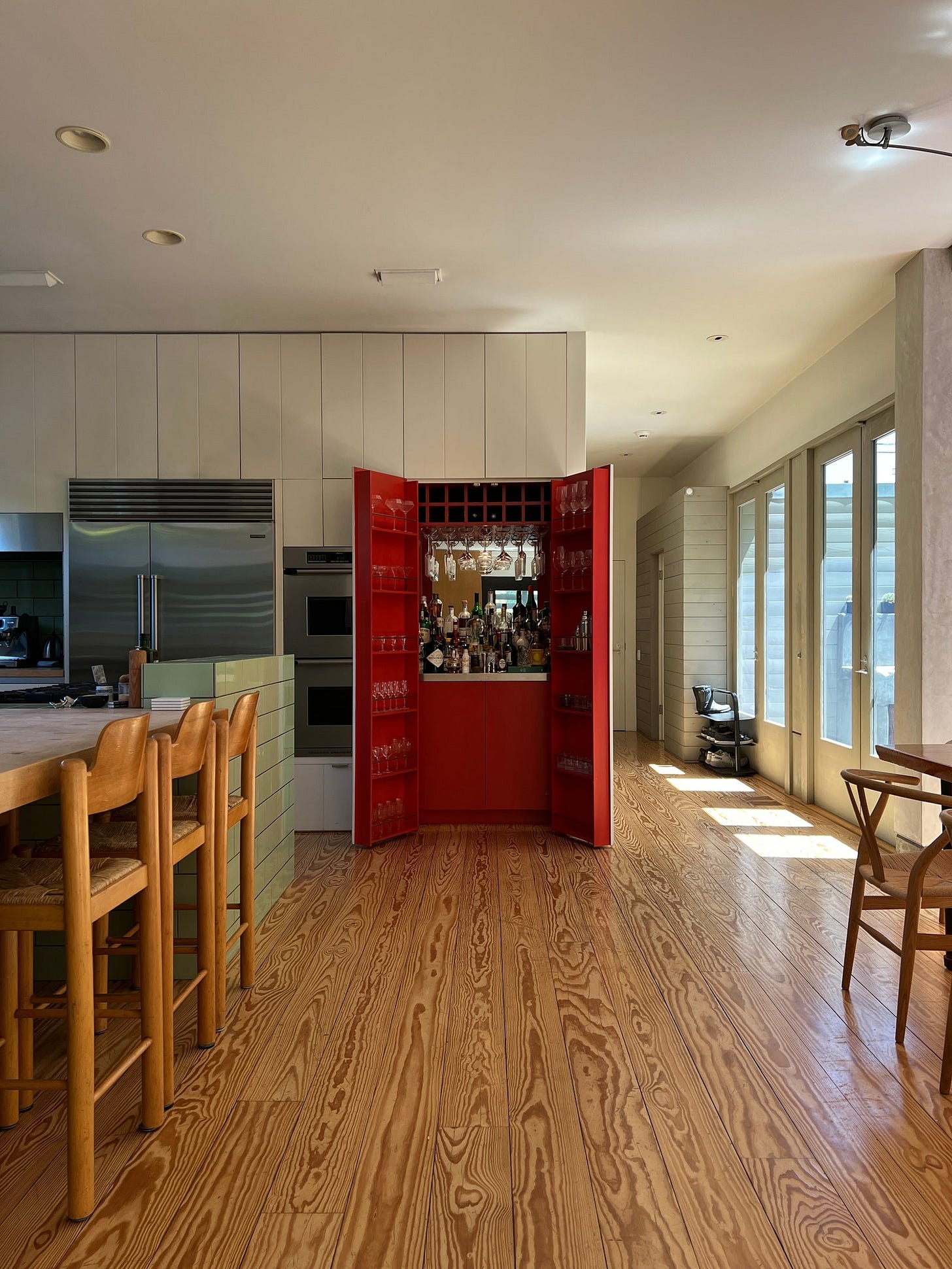 Jamie says that the bar cabinet is “such a surprise and delight element that youre not really expecting but then its...