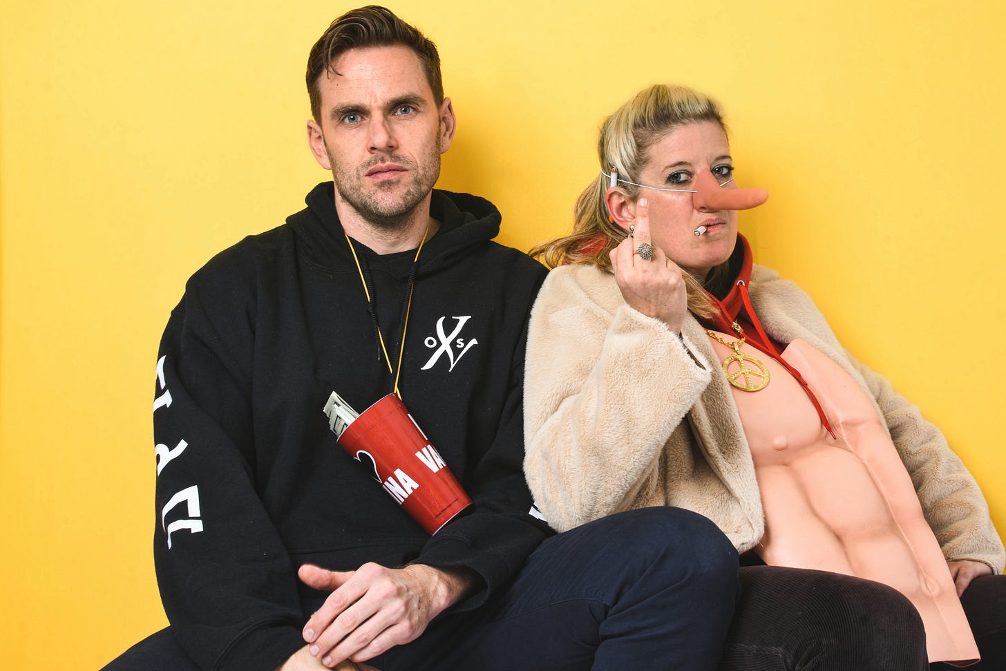 Photo showing Kate Bond and Morgan Lloyd of You Me Bum Bum Train swearing at the camera