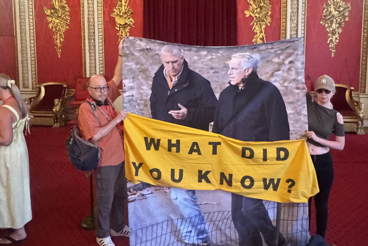 Two activists staged a stunt with an image of Andrew Mountbatten-Windsor and convicted paedophile Jeffrey Epstein in the Throne Room at Buckingham Palace