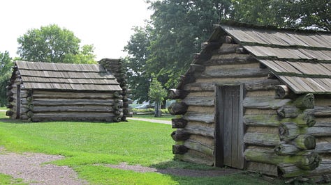 Pictures from Valley Forge Historic National Park in Valley Forge, Pa., including George Washington's headquarters, soldiers log huts, the Memorial Arch, the parade field, and a cannon next to an old tree.