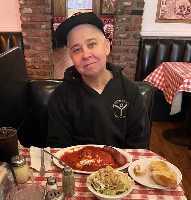 Ali Liebegott eating a delicious Italian food meal