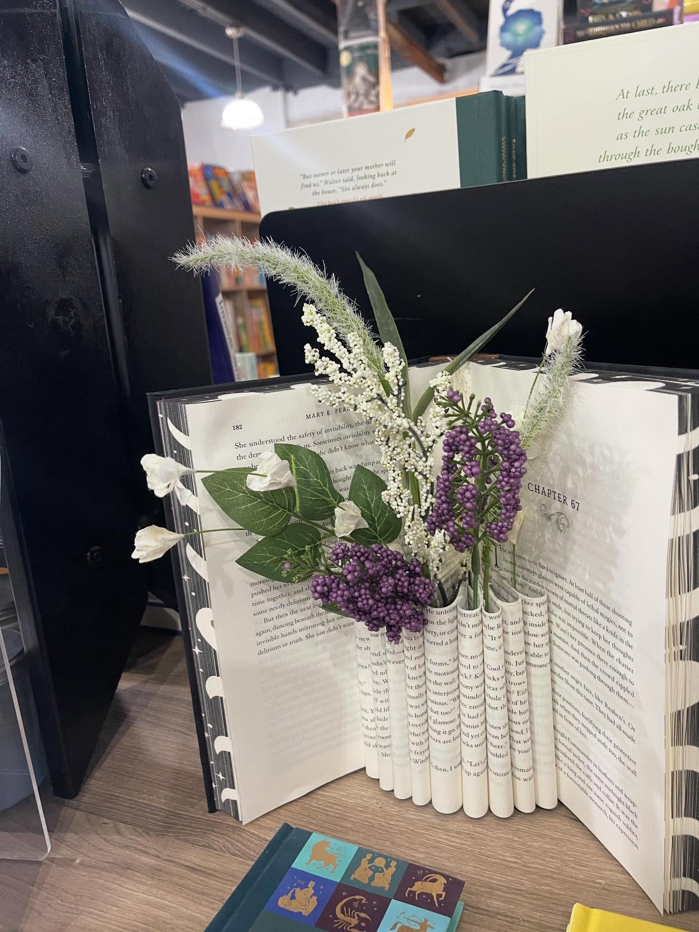 May be an image of diary, flower arrangement, book, amaranth and text