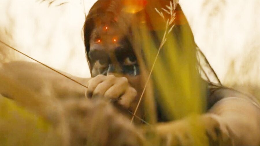 Screencap from Prey that illustrates the technological disadvantage of the Indigenous people facing the Predator in the 1700s. Fun, fun film!