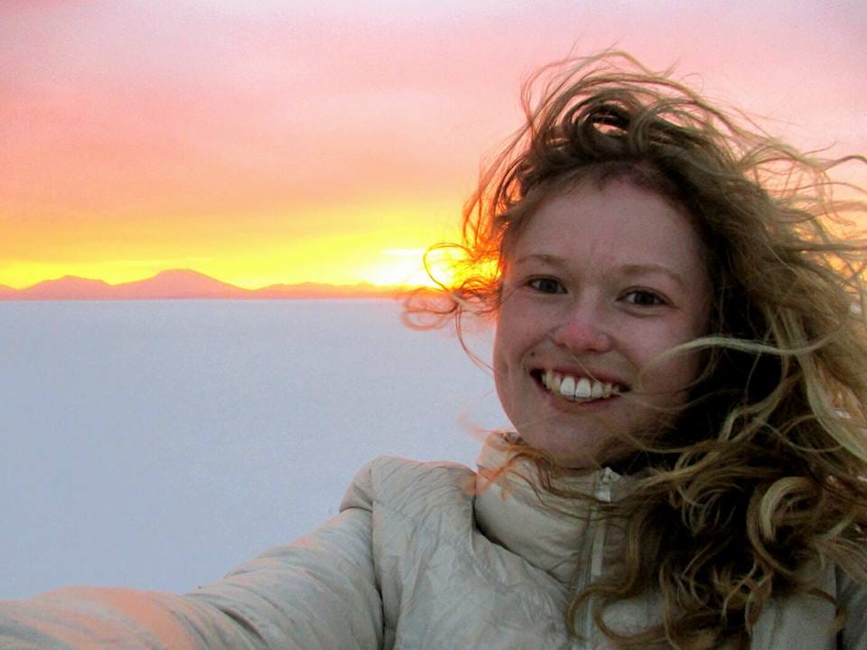 Selfie of a young woman at the Bolivian Salt Flats at sunset