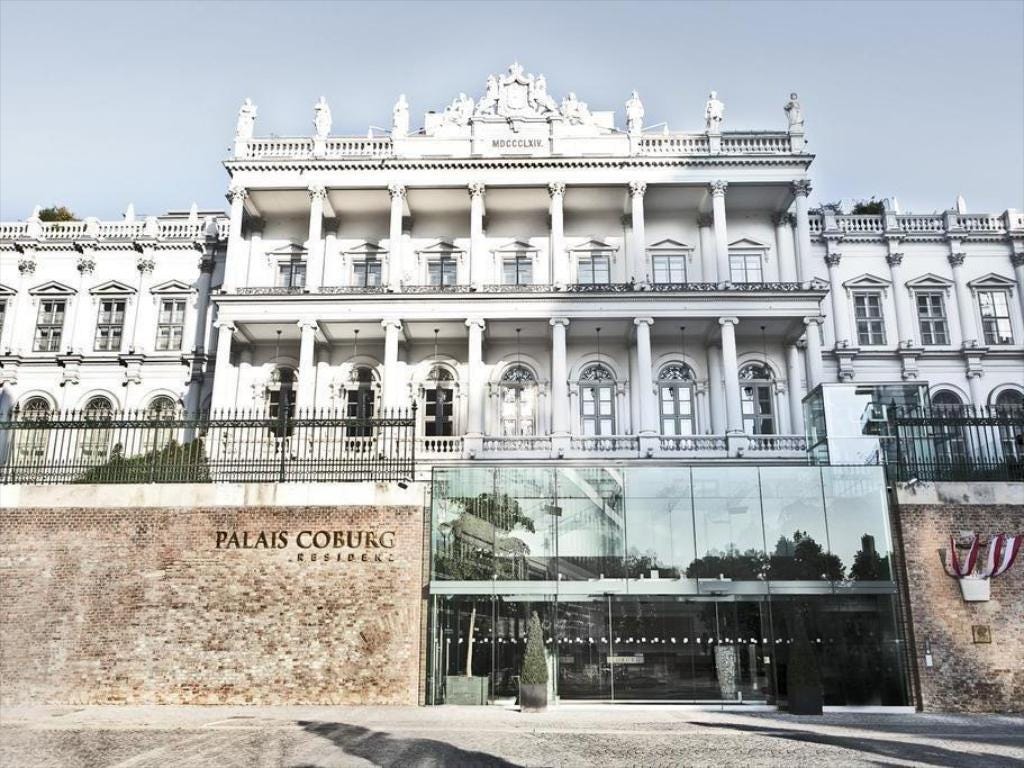 A picture containing building, outdoor, government building, white

Description automatically generated