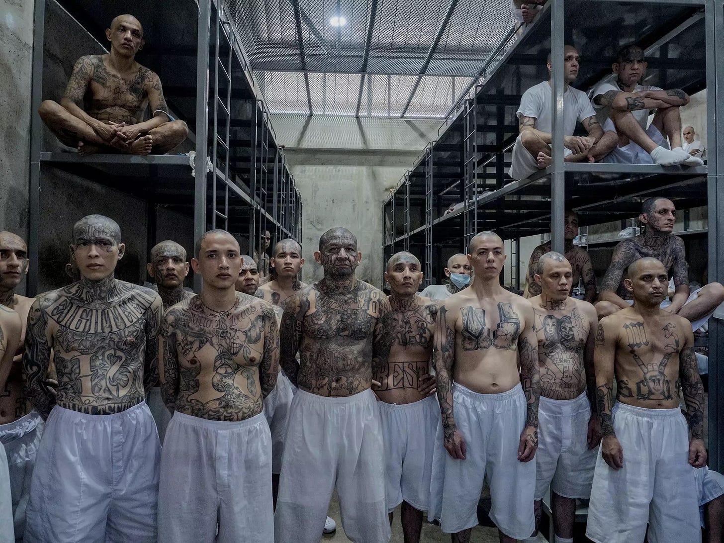 Gang members inside the Terrorism Confinement Centre, El Salvador. © Juan Carlos Gang members inside the Terrorism Confinement Centre, El Salvador. © Juan Carlos