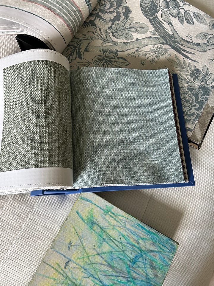 fabric swatches and a painting of wildflowers