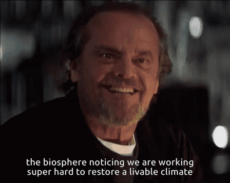GIF of Jack Nicholson grinning broadly in a dim room. Text: "the biosphere noticing we are working super hard to restore a livable climate"