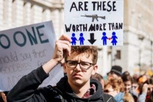 Protester holding a sign