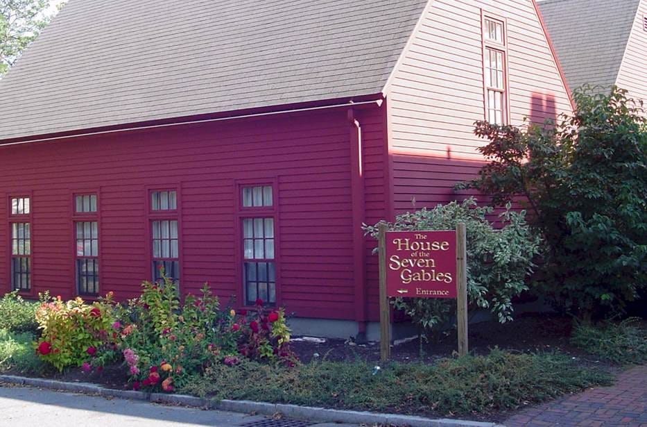 A red house with a sign
AI-generated content may be incorrect. A red house with a sign
AI-generated content may be incorrect.
