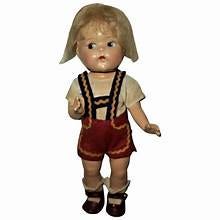 A doll with a white background

Description automatically generated