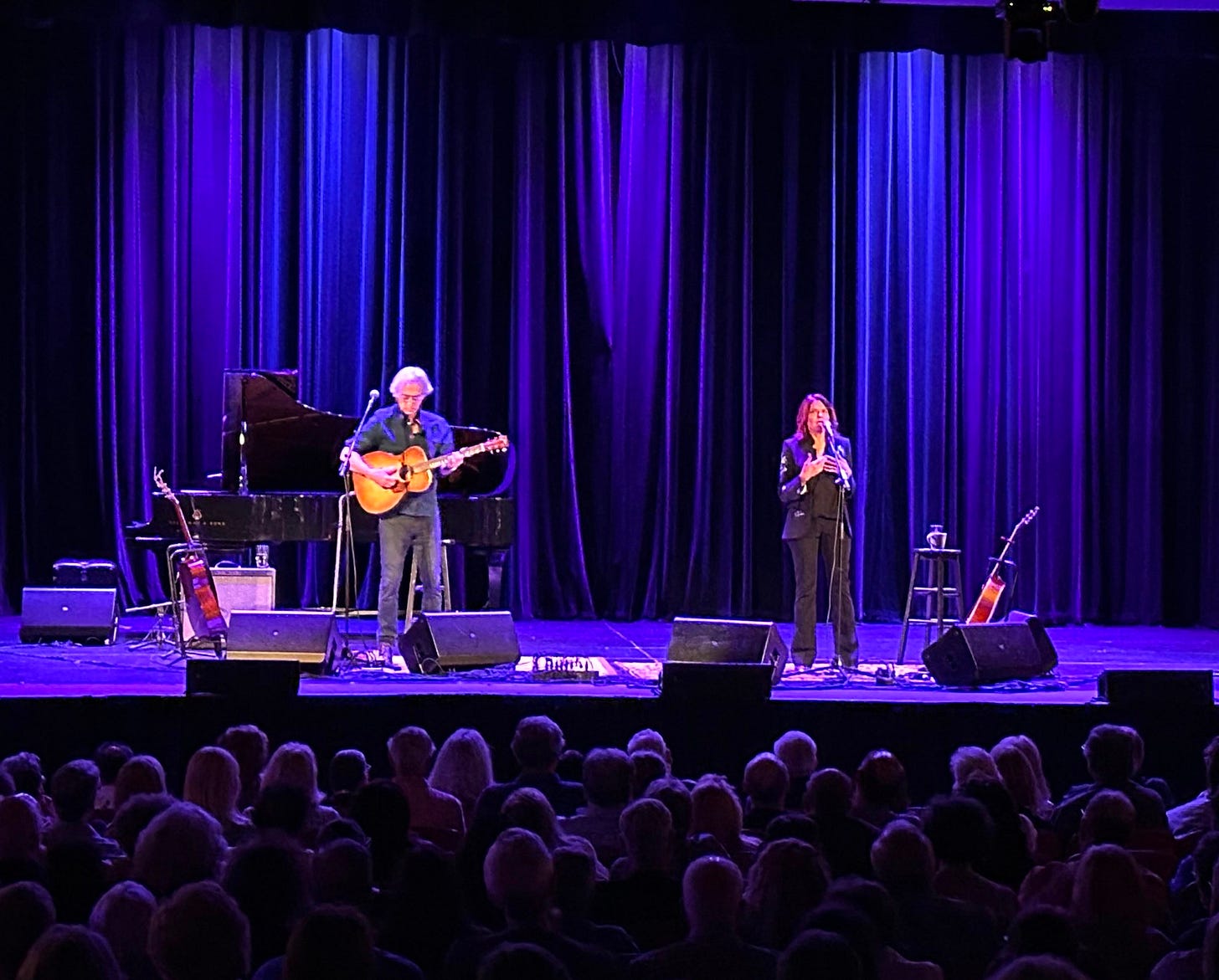 May be an image of 2 people and guitar May be an image of 2 people and guitar